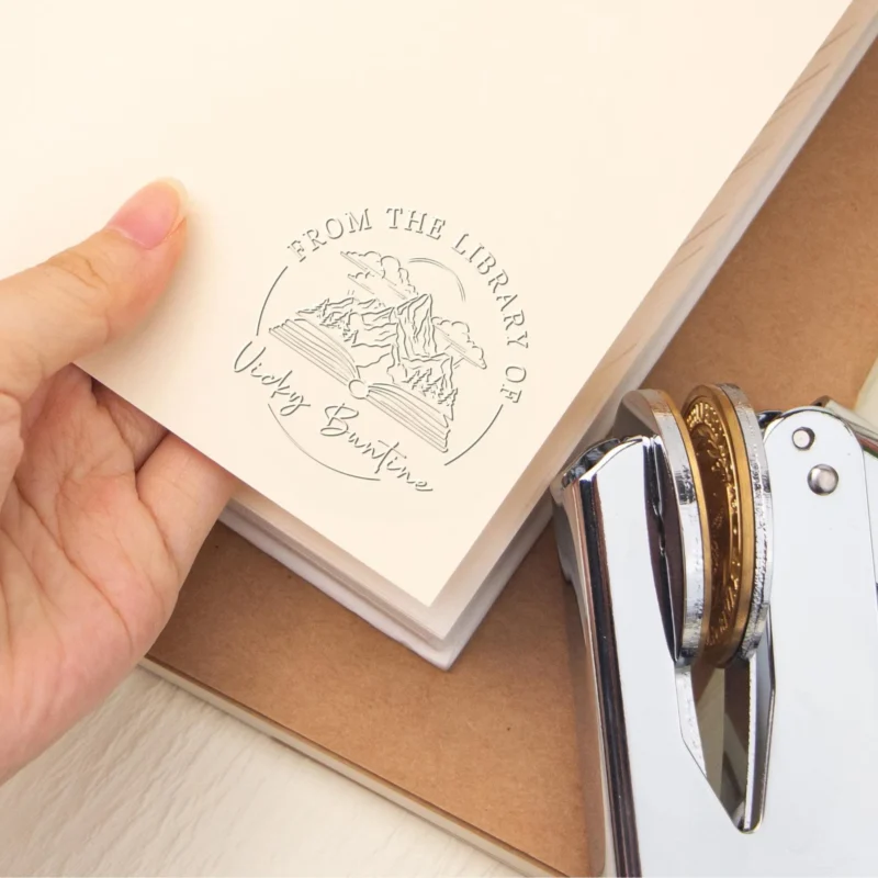 from the library of embossed on to book with personalised book embosser